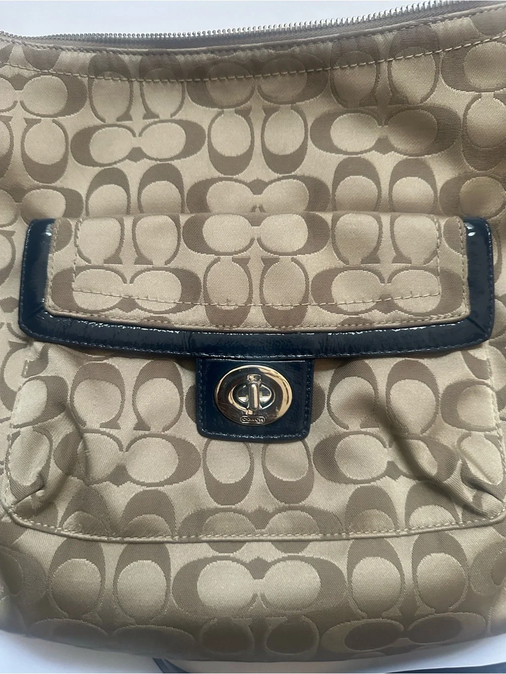 Coach Tan Signature Canvas Crossbody with Black Trim and Turn-Lock